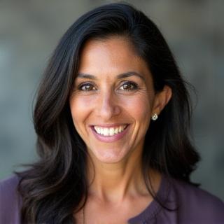 Professional headshot of Anya Sharma.